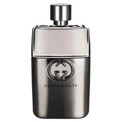 A bottle of Gucci Guilty Pour Homme Eau de Toilette with a metallic silver and glass design.