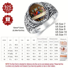 A vintage silver ring featuring a round Last Supper scene with an engraved band.