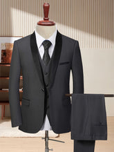 A charcoal grey three-piece suit featuring a shawl collar jacket, vest, and matching trousers.