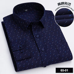 A navy blue long-sleeved button-down shirt with a small white and blue geometric print.