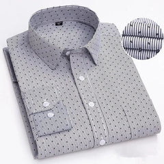 A long-sleeved button-down shirt with a white and black vertical striped pattern.