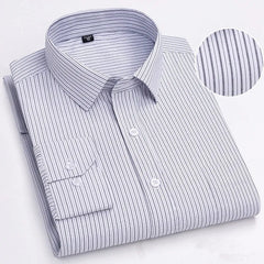 A long-sleeved, button-down men's shirt in white with thin vertical grey stripes.