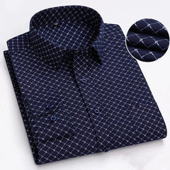 A navy blue long-sleeve button-down shirt featuring a white geometric grid pattern.