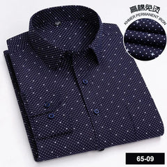 A navy blue long-sleeve button-down shirt featuring a white cross-pattern print.