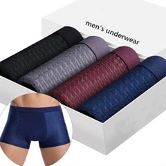 A box containing four pairs of solid-colored microfiber boxer briefs in black, grey, red, and blue.