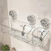 Two clear plastic bathroom storage baskets with suction cup mounts and decorative rabbit figures.