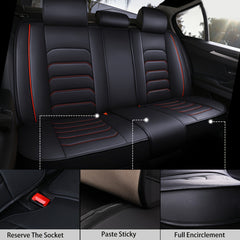 Black faux leather rear car seat covers with red accents and detailed installation features.
