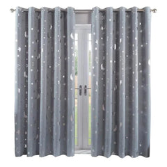 A pair of gray blackout curtains featuring a silver printed pattern of stars and crescent moons.