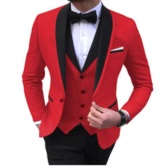 A man wears a red three-piece suit featuring a black shawl lapel, a vest, and a black bow tie.