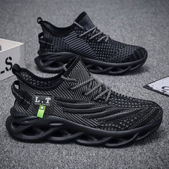 A pair of black breathable mesh sneakers with patterned laces and unique blade-style soles.