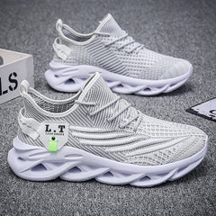 A pair of light gray breathable mesh sneakers with white blade-style soles and lace-up closures.