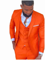 A man wears a bright orange three-piece slim-fit suit with a white shirt and notch lapels.