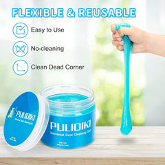 A jar of blue Pulidiki cleaning gel sits on a wooden surface next to a hand holding a glob of it.