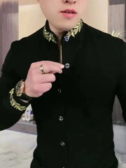 A black slim-fit long-sleeved shirt featuring a stand-up collar with gold leaf embroidery.
