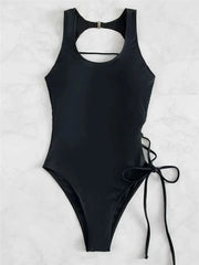 A black one-piece swimsuit featuring a high neckline, a cutout back, and side lace-up details.
