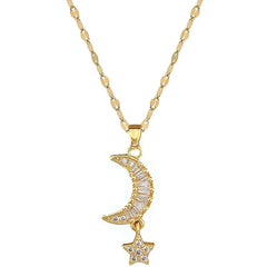 A gold-toned necklace featuring a crescent moon pendant encrusted with baguette stones and a dangling star charm on a delicate chain.