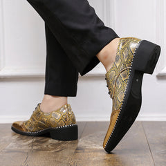 Men's yellow and black snakeskin-patterned oxford dress shoes with a round toe and rubber sole.