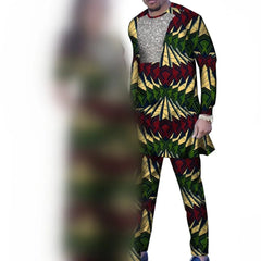 A man wears a long-sleeved tunic and matching trousers featuring a geometric African print.