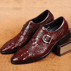 Men's glossy red crocodile print loafers with a pointed toe and a silver side buckle.