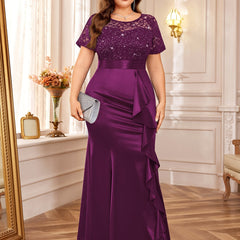 A plus size purple mermaid dress with a sequined lace bodice, short sleeves, and ruffled trim.