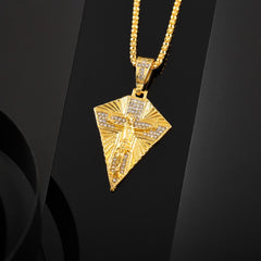 A gold-toned hip hop style cross pendant necklace featuring a crucifix design with crystal accents.