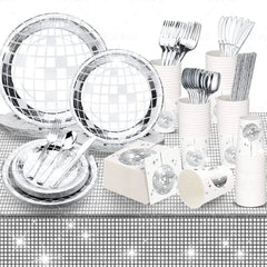 A disco ball themed disposable tableware set featuring plates, cups, napkins, and silver cutlery.