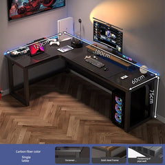 An L-shaped corner computer desk with a carbon fiber finish and a black steel frame.
