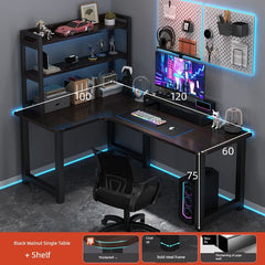 An L-shaped computer desk with an integrated bookshelf and a dark wood finish.