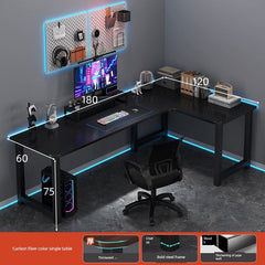 An L-shaped corner computer desk with a carbon fiber finish and a black steel frame.