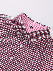 A red and navy blue gingham button-up shirt with a collar and size M tag.