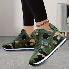 Women's camouflage high-top lace-up sneakers with a white midsole and fabric upper.