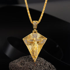 A gold-toned hip hop cross pendant necklace featuring a crucifix design with embedded crystals.