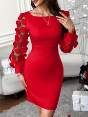 A woman wears a red bodycon dress with a square neckline and sheer sleeves adorned with red petals.