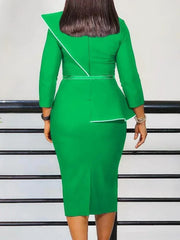 A woman wears a green midi-length sheath dress with a peplum waist and white trim detail.