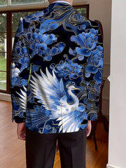 A man wears a navy blue blazer featuring a white crane and floral print on the back.