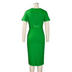 A back view of a solid green short-sleeved midi dress with a belted waist and a back slit.