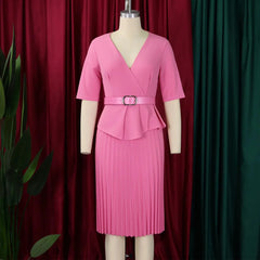 A pink V-neck midi dress with half sleeves, a belted waist, peplum detail, and a pleated skirt.