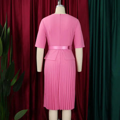 A pink mid-calf professional dress with half sleeves, a belted waist, and a pleated skirt.