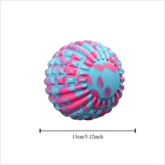 A blue and pink marbled massage ball with a textured surface measuring 13 centimeters in diameter.