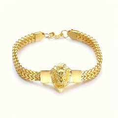 A gold-plated stainless steel bracelet featuring a lion head centerpiece and a braided chain.