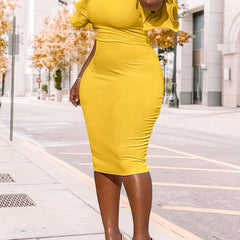 A woman wears a yellow midi-length bodycon pencil dress with short ruffle sleeves.