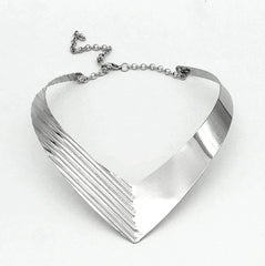 A silver-toned V-shaped collar necklace with a textured ribbed finish on one side.