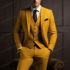 A man wears a formal three-piece orange suit consisting of a blazer, vest, and trousers.
