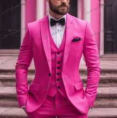 A man wears a vibrant pink three-piece suit featuring a blazer, vest, and a black bow tie.