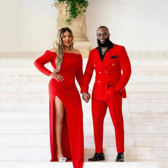 A man wears a red double-breasted slim fit suit with a black shirt standing next to a woman.