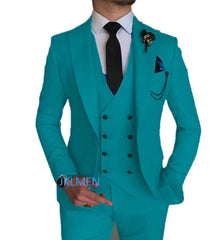 A man wears a three-piece sky blue suit with a peak lapel, black tie, and decorative brooch.