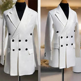 A white double-breasted long blazer for men featuring a peaked lapel and black buttons.