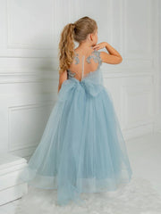 A young girl wears a floor-length, light blue tulle princess gown with lace and beaded details.