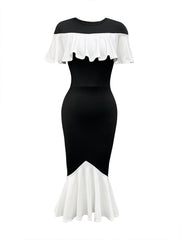 A black and white bodycon fishtail dress with a round neck and ruffled off-shoulder trim.