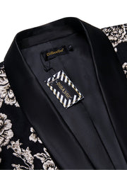 A black men's blazer featuring a silver floral pattern and a solid black satin shawl lapel.